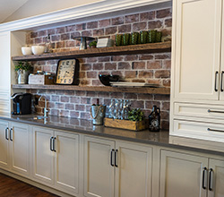 Northern Classic Cabinetry with brick background